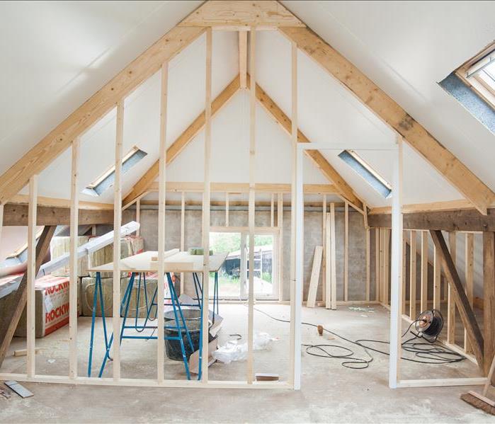 Home renovation in an attic with vaulted ceilings